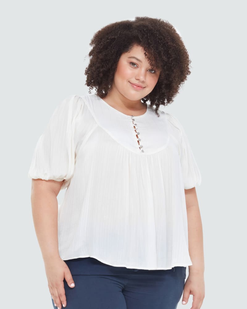 Front of a model wearing a size 0X Chloe Henley Front Top in Cream by DEX PLUS. | dia_product_style_image_id:268405
